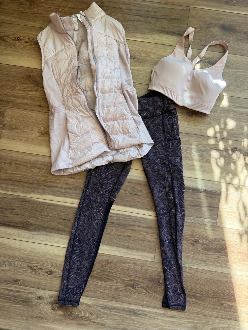 lululemon athletica Pink Puffer Vest with Black Patterned Leggings